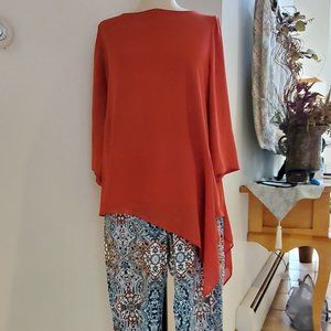 Burnt red blouse with assymetric hankerchief hem with matching skinny pants